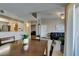 Inviting living space featuring open layout with dining area, living room, kitchen, and natural light at 8000 Badura Ave # 2063, Las Vegas, NV 89113