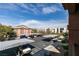 Apartment parking area with covered parking spots and well maintained landscape at 8000 Badura Ave # 2063, Las Vegas, NV 89113