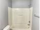 Bright bathroom features a white bathtub and shower with a tile surround at 8089 Windmill Villa St, Las Vegas, NV 89139