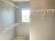 Walk in closet with white wire shelves and a window offering natural light at 8089 Windmill Villa St, Las Vegas, NV 89139