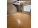 Inviting living room with laminate wood flooring and a ceiling fan at 8089 Windmill Villa St, Las Vegas, NV 89139