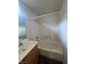 Standard bathroom featuring a tub-shower combo and a single sink vanity at 8226 Royal Lilly Ct, Las Vegas, NV 89139