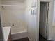 Bright bathroom with a shower and tub combination and modern fixtures at 8226 Royal Lilly Ct, Las Vegas, NV 89139