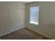 Bedroom featuring a window and closet, ideal for comfort and storage at 8226 Royal Lilly Ct, Las Vegas, NV 89139