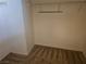 A clean and empty walk-in closet with carpet and shelving at 8226 Royal Lilly Ct, Las Vegas, NV 89139