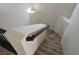 View of the carpeted stairs with white wall and black handrail leading upward from the second floor at 8226 Royal Lilly Ct, Las Vegas, NV 89139