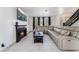 Comfortable living room boasting a fireplace and large sectional sofa at 9005 Feather River Ct, Las Vegas, NV 89117