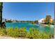 Picturesque waterfront homes with private docks and boats on a sunny day, offering a serene lifestyle at 9005 Feather River Ct, Las Vegas, NV 89117