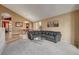 Comfortable living room with neutral tones, plush carpeting, and an open layout at 950 Eagle Mountain Dr, Las Vegas, NV 89123