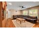 Spacious living room features hardwood floors, built-in shelving, and a large window at 950 Eagle Mountain Dr, Las Vegas, NV 89123