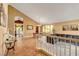 Bright living space with high ceilings and tiled floors; view into the dining room at 950 Eagle Mountain Dr, Las Vegas, NV 89123