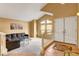 Cozy living room with vaulted ceilings, a plush sofa, and stylish decor at 950 Eagle Mountain Dr, Las Vegas, NV 89123