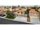 Home with three-car garage, well-manicured landscaping, and proximity to neighborhood amenities at 9843 Frosty Canyon Ct, Las Vegas, NV 89183