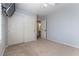 Bedroom with closet, carpeted floor, and ensuite bathroom view at 9843 Frosty Canyon Ct, Las Vegas, NV 89183