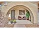 Inviting covered front porch featuring a seating area with attractive decor at , Las Vegas, NV 89139