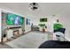 Comfortable living room featuring a wall mounted fireplace, modern flooring and neutral paint at , Las Vegas, NV 89139