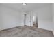 Bedroom featuring neutral carpet and a view into an adjoining bathroom at 10161 Ocher Valley Ave, Las Vegas, NV 89178