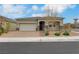 Charming single-story home with a two-car garage, desert landscaping, and a welcoming front entrance at 10161 Ocher Valley Ave, Las Vegas, NV 89178