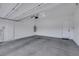 Spacious two-car garage with concrete floor and automatic door at 10161 Ocher Valley Ave, Las Vegas, NV 89178