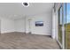 Bright and open living room with sliding glass doors providing access to the outdoor space at 10161 Ocher Valley Ave, Las Vegas, NV 89178
