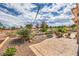 Backyard with desert landscaping, patio, and a great view at 10537 Shoalhaven Dr, Las Vegas, NV 89134