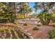 Landscaped entrance to Sun City Summerlin, a Del Webb community, with flowers at 10537 Shoalhaven Dr, Las Vegas, NV 89134