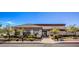 Exterior of the community fitness center showcasing modern architecture, desert landscaping, and ample parking at 10537 Shoalhaven Dr, Las Vegas, NV 89134