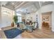 Open concept living room with wood floors and elegant decor at 10537 Shoalhaven Dr, Las Vegas, NV 89134