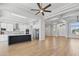 Open floor plan with wood floors, modern kitchen and lots of natural light at 10537 Shoalhaven Dr, Las Vegas, NV 89134