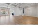 Spacious open floorplan featuring wood floors, modern lighting, and lots of natural light at 10537 Shoalhaven Dr, Las Vegas, NV 89134