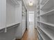 Walk-in closet with built-in shelves and drawers, providing ample storage space at 10537 Shoalhaven Dr, Las Vegas, NV 89134