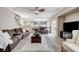 Inviting living room featuring plush seating, television, and bright decor at 10657 Medicine Bow St, Las Vegas, NV 89183