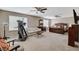 Spacious main bedroom features two ceiling fans, large windows, and room for a treadmill at 10657 Medicine Bow St, Las Vegas, NV 89183
