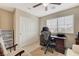 Bright office featuring a desk with a chair and a large storage cabinet at 10657 Medicine Bow St, Las Vegas, NV 89183