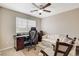 Office featuring a desk and chair and a cozy sofa at 10657 Medicine Bow St, Las Vegas, NV 89183