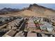Panoramic aerial of homes with mountain views, highlighting the layout and surrounding landscape at 10936 White Alder Pl, Las Vegas, NV 89138