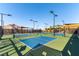 Outdoor pickleball courts with lights and shade coverings offer active recreation and community fun at 11161 Black Fire Opal Dr, Las Vegas, NV 89138