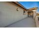 Spacious covered balcony area offering additional outdoor living space with neutral stucco exterior at 12283 Lost Treasure Ave, Las Vegas, NV 89138