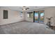 Spacious bedroom with a large window and sliding glass door leading to a balcony at 12283 Lost Treasure Ave, Las Vegas, NV 89138