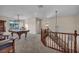Large bonus room features a pool table and staircase access to another level at 12283 Lost Treasure Ave, Las Vegas, NV 89138