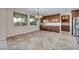 Dining room featuring built-in cabinets and backyard views at 12283 Lost Treasure Ave, Las Vegas, NV 89138