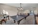 Game room with a ping pong table, stools, and shuffleboard table at 12283 Lost Treasure Ave, Las Vegas, NV 89138