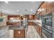 Spacious kitchen with stainless steel appliances and a large granite island at 12283 Lost Treasure Ave, Las Vegas, NV 89138