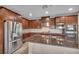 Well-equipped kitchen with stainless steel appliances, granite countertops, and ample storage space at 12283 Lost Treasure Ave, Las Vegas, NV 89138