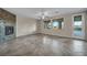 Living room featuring tiled floor, gas fireplace and ceiling fan at 12283 Lost Treasure Ave, Las Vegas, NV 89138