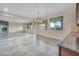 Open floor plan showcasing kitchen, dining and living areas with fireplace at 12283 Lost Treasure Ave, Las Vegas, NV 89138