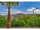 Backyard landscaping and views of mountains and desert hills in the distance at 12283 Lost Treasure Ave, Las Vegas, NV 89138