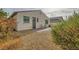 Low maintenance backyard with gravel and block wall at 130 Mountain Cedar Ct, North Las Vegas, NV 89031