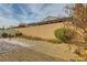Backyard featuring low-maintenance landscaping, a brick patio, and privacy fencing at 130 Mountain Cedar Ct, North Las Vegas, NV 89031