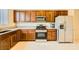 Modern kitchen featuring stainless steel appliances, granite countertops, and ample cabinet storage space at 130 Mountain Cedar Ct, North Las Vegas, NV 89031